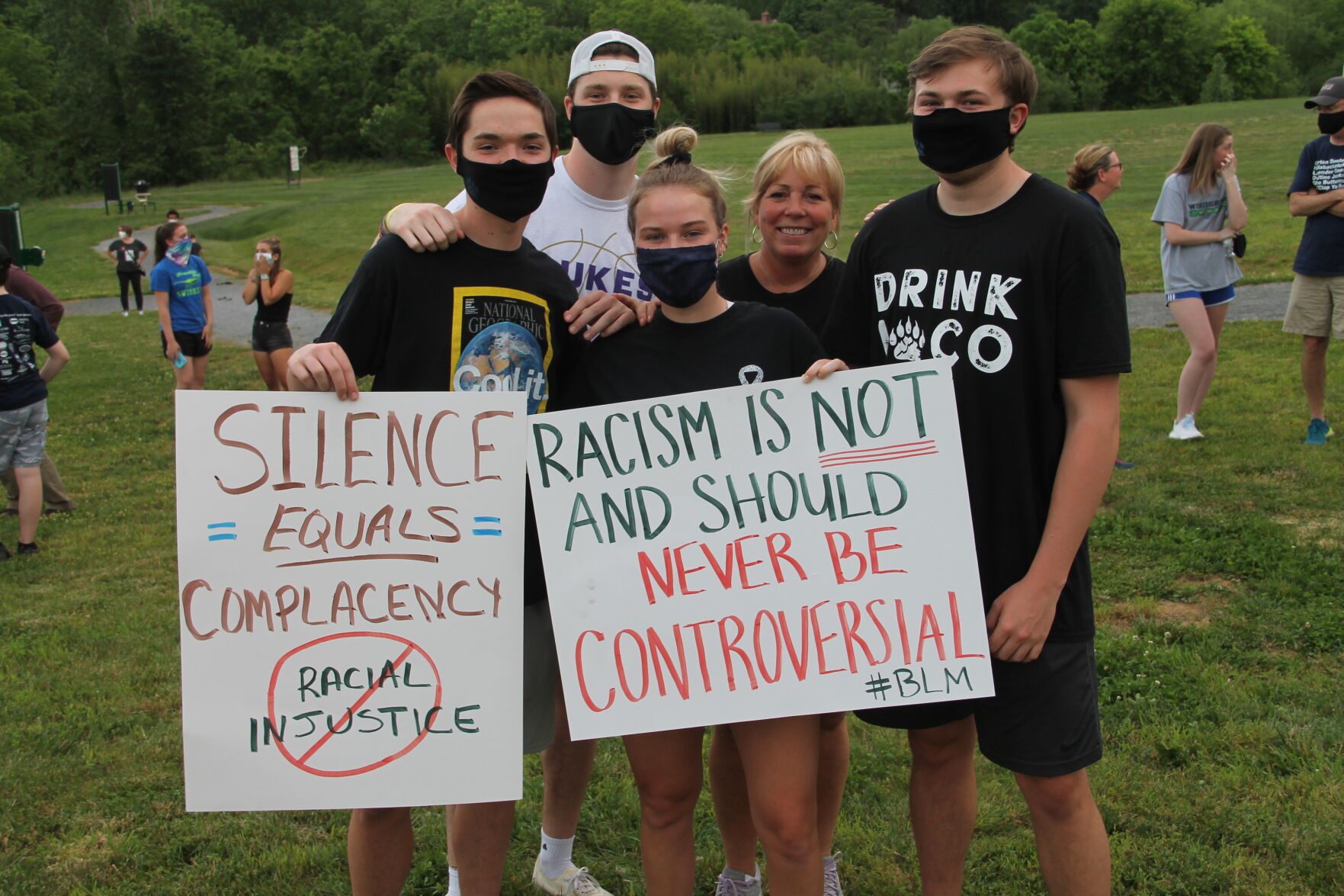 Large crowd turns out in Round Hill for a peaceful protest, vigil